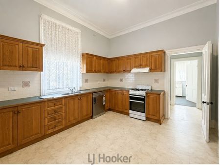 Huge Five Bedroom Home with Enormous Yard & Versatile Living - Photo 2
