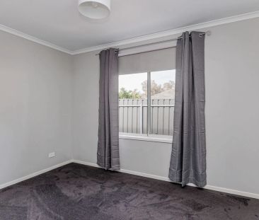 Three Bedroom Two Bathrooms In Wanted Locale - Photo 6