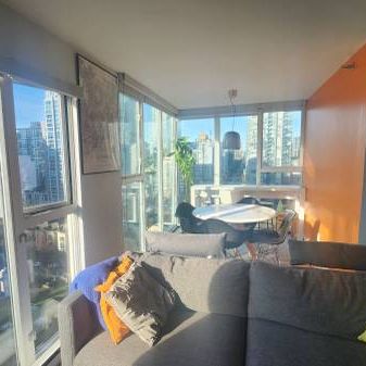 Furnished Corner Unit 1 Bed + Den 682sqf - Photo 4