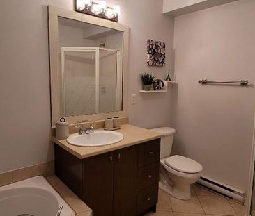 ✨ Condo 4½ à Saint-Hubert | 2 stationnements | Climatisation | Balc... - Photo 4