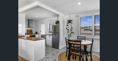 Renovated Family Home with Modern Finishes & Secure Yard - Photo 2