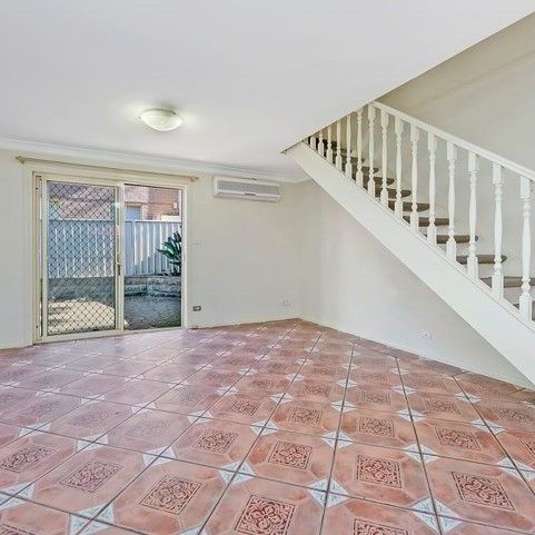 Spacious Three Bedroom House in Great Location - Photo 1