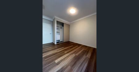 Spacious 4 Bed | 2 Bath | 2 Car | Large Covered Balcony | Floorboards Throughout | Storage Room - Photo 4