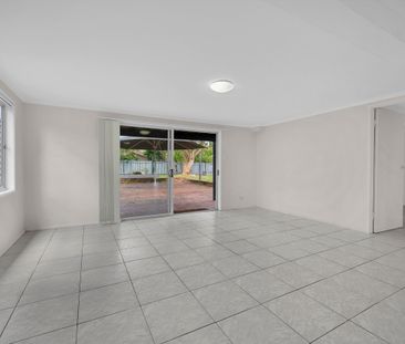 A charming home set on a generous block with a sprawling backyard. - Photo 1