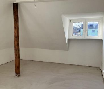 Gemütliche Dachgeschosswohnung mit Potential - Photo 4