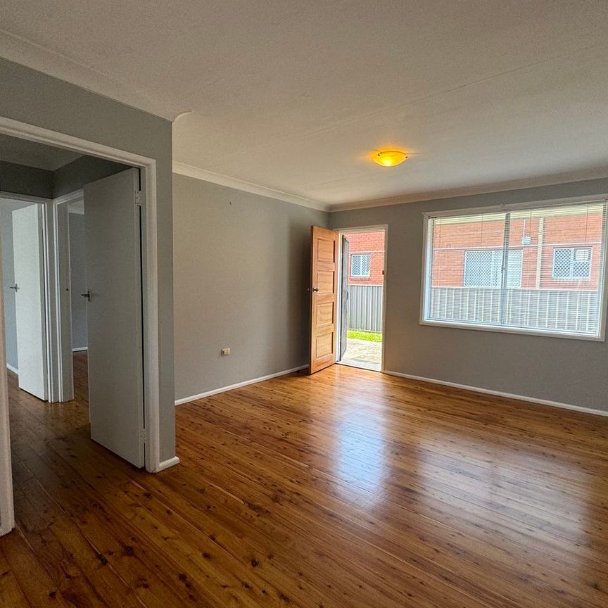 Beachside Convenience – 2 Bedroom Unit - Photo 1