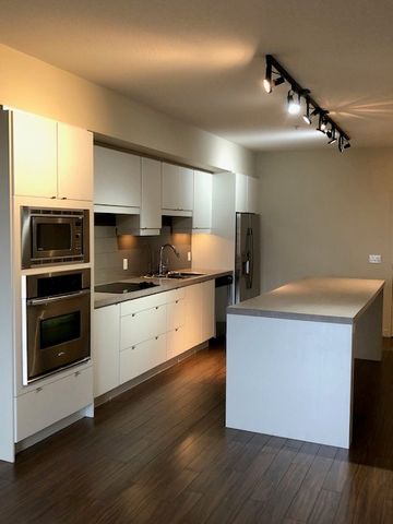 Venu Living at its finest – 1 bedroom plus den - Photo 4