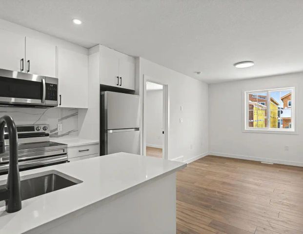 1 Bedroom Garage Suite for Rent in ALCES SW! — 1 Bedroom Garage Suite - Photo 1