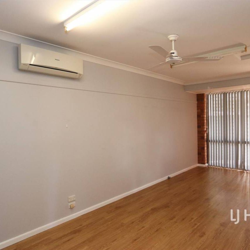 Quality Unit in Convenient Setting - Photo 1