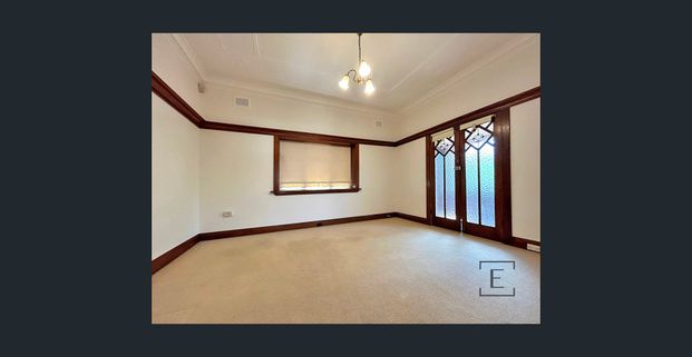 Spacious 3-Bedroom Home with Garden Bliss! - Photo 1