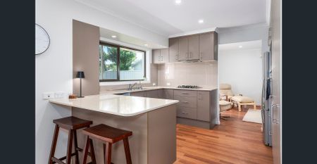 Experience Relaxed Coastal Living in This Stunning Waterfront Home - Photo 4