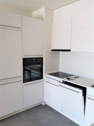 Affittiamo luminoso 2.5 locali immerso nel verde nel cuore di Pazzallo - Photo 1