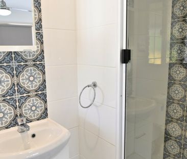 MODERN COASTAL LIVING WITH STYLISH INTERIORS, SHED & SPACIOUS ENTER... - Photo 6