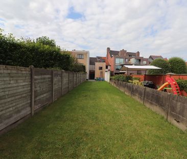 Een gerenoveerde eengezinswoning met 4 slaapkamers en tuin. - Foto 6