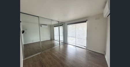 Sunlit Family Haven with Modern Comforts in the Heart of Somerville - Photo 4