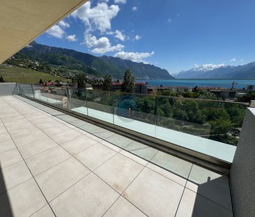 APPARTEMENT DE 2,5 PIÈCES EN ATTIQUE AVEC VUE PANORAMIQUE SUR LE LAC - Photo 4