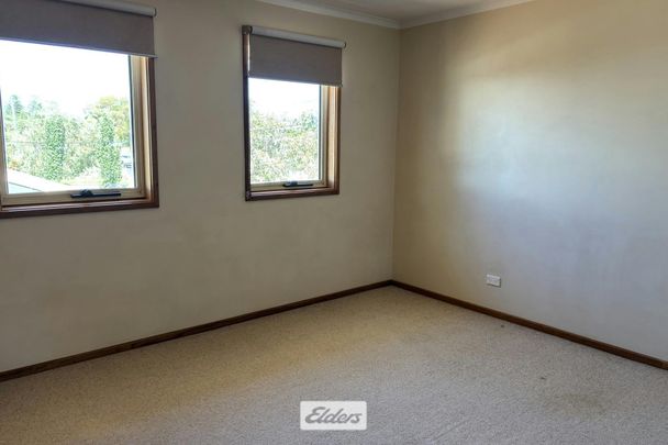 CENTRALLY LOCATED TOWNHOUSE - Photo 1