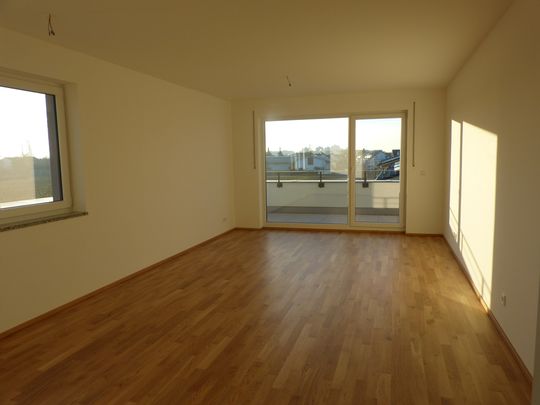 Dachgeschosswohnung in 82008 Unterhaching zur Miete - Photo 1