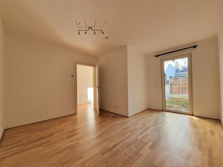 Schicke Neubauwohnung mit kl. Garten in idyllischer Ruhelage - Photo 2