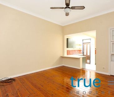 PERFECTLY LOCATED AND CHARMINGLY UNIQUE HOME - Photo 1