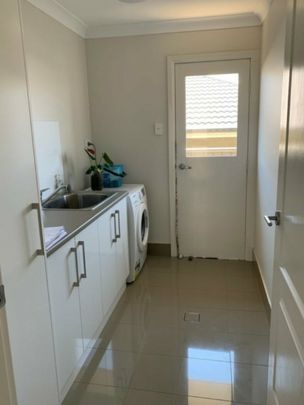 Modern 3-Bedroom Home with Double Garage & Spacious Living - Photo 1