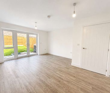 A newly built two bedroom house in Springstead Village - Photo 1