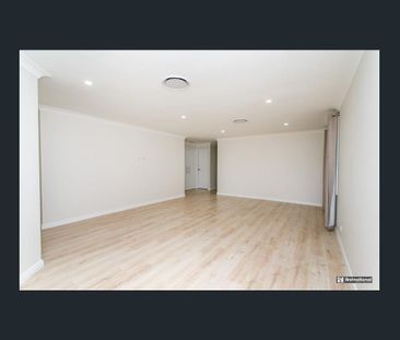 Family Comfort in a Quiet Glenmore Park Cul-de-sac - Photo 2