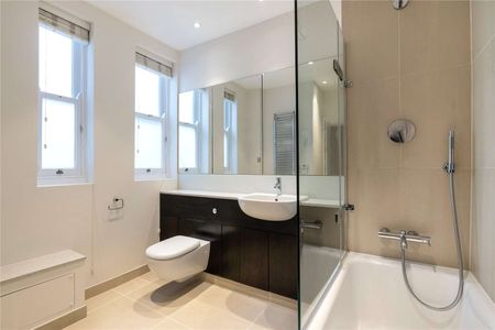 A beautiful third floor apartment (with lift) in a period building situated moments from Sloane Square and the amenities of Pavilion Road. - Photo 3