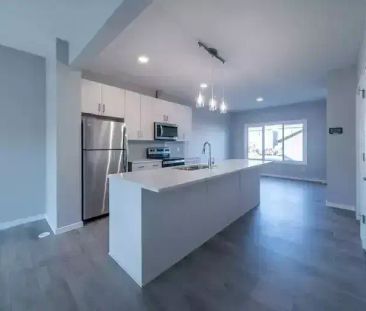 Beautiful 3-Bedroom Main Floor Suite in Glenridding Ravine! Availab... - Photo 1