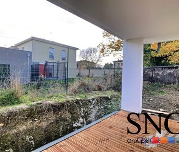 T3 AVEC TERRASSE/JARDIN ET PARKING - Photo 2