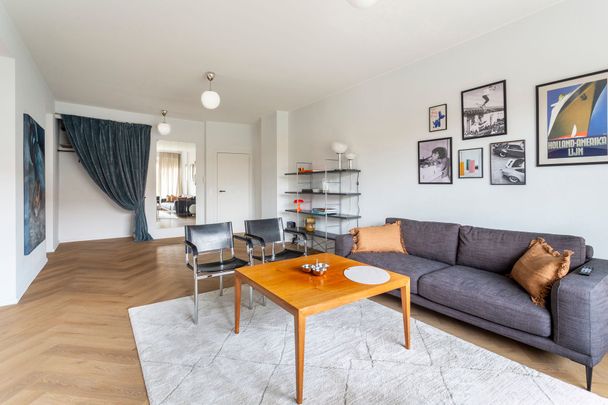 Volledig gerenoveerd gemeubeld appartement met buitenruimte aan het Zuidpark - Photo 1