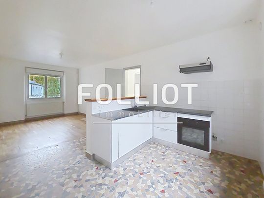 À louer : maison spacieuse avec garage, centre-ville et voie verte à pied - Photo 1