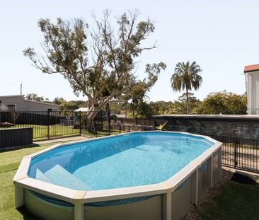 Charming Family Home with Swimming Pool in Convenient Locale - Photo 3