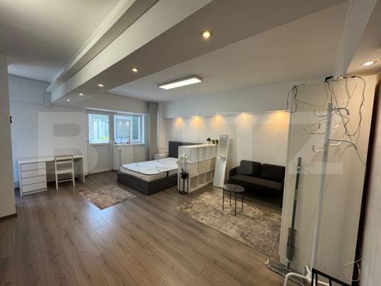 Garsoniera de inchiriat, 38 mp, open space, centrala proprie - Photo 1