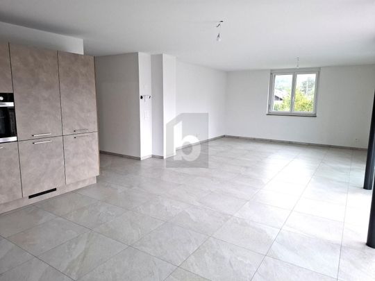 NEW, SPACIOUS AND MODERN - Photo 1