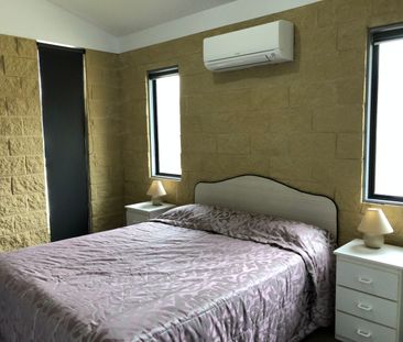 Conveniently Located Unit with Flexible Furnishing Options - Photo 1