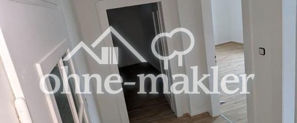 Charmante neurenovierte 3-Zimmer-Wohnung mit moderner Küche im Erdgeschoss - Foto 1