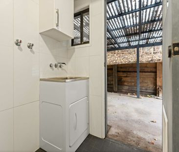 Discover Low-Maintenance Living with A/C & Tiled Floors - Photo 5