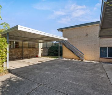 Upstairs unit in prime location! - Photo 1