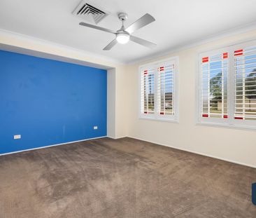 Stylish Family Home with Pool and Multiple Living Areas - Photo 1