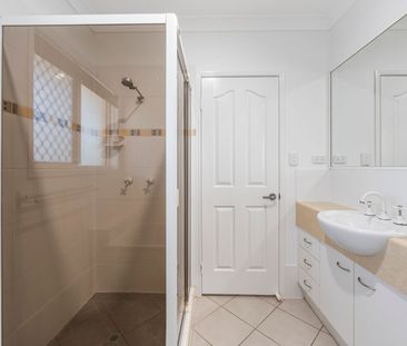 Coastal Comfort Awaits: Your Modern Haven in Woody Point - Photo 3