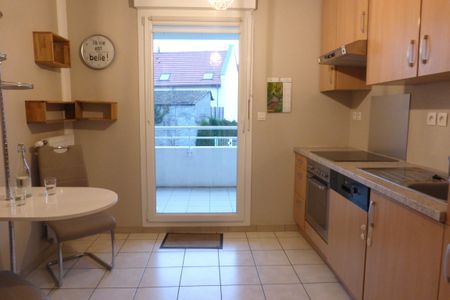 Location Appartement HUNINGUE 840 € CC - Photo 4