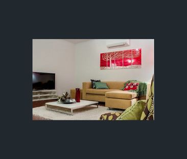 Neat Three-Bedroom Home in Convenient Location - Photo 1