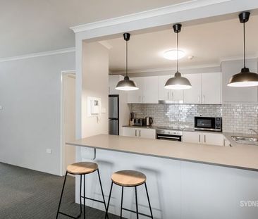 Large Updated Two Bedroom | Furnished - Photo 5