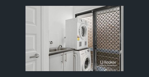 Designer Family Home with Multiple Living Zones - Photo 1