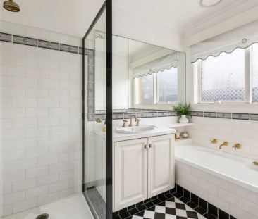 CHARMING VICTORIAN-INSPIRED HOME IN A BRIGHT, LOW MAINTENANCE GARDE... - Photo 6