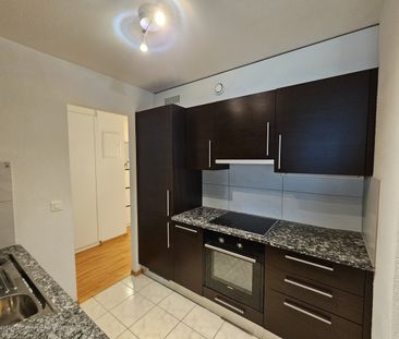 Appartement de 3.5 pièces au rez avec jardin - Photo 1