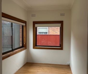 Freshly renovated house In Walk-to Everything Location perfect from... - Photo 1