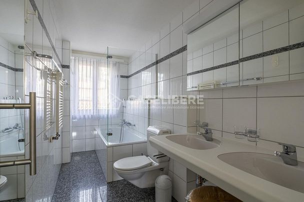 3.5 LOCALI VISTA LAGO IN MURALTO - Photo 1