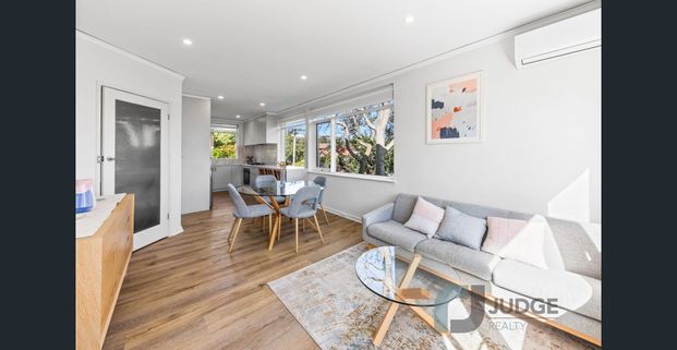 Contemporary Comfort with Urban Convenience - Photo 1